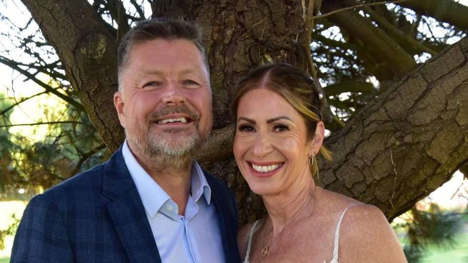 Robbie and Tor Smith, founders of Proper Kip, smiling together under a tree